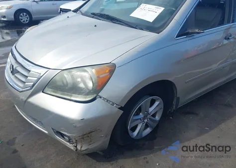 2009 Honda Odyssey Touring z USA, uszkodzony, nr VIN 5FNRL38989B011507